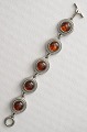 Tin bracelet with amber